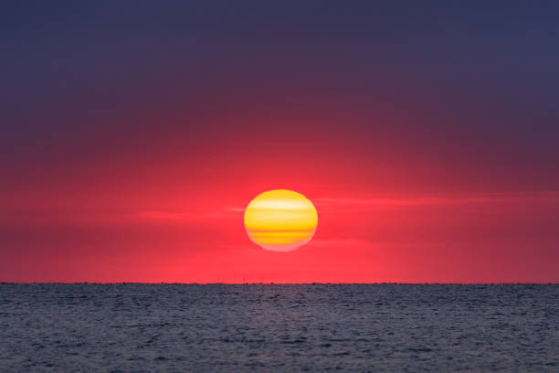 sunrise at sea stock photo
