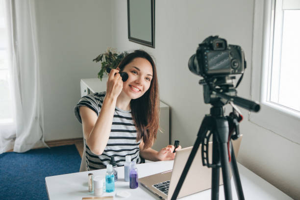 istock Beauty blogger shows how to do makeup 1149136928