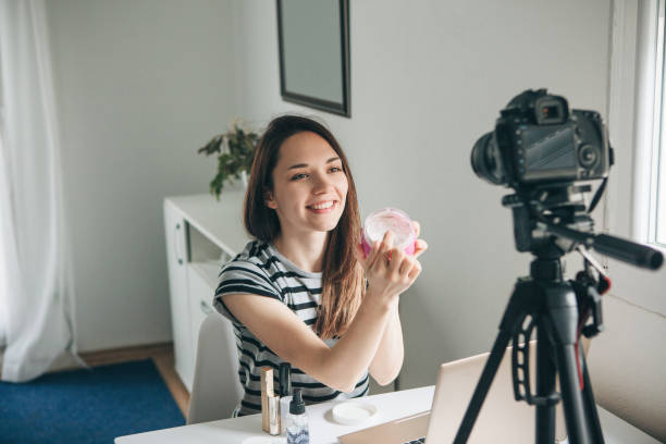 istock Girl videoblogger records video. 1149137913