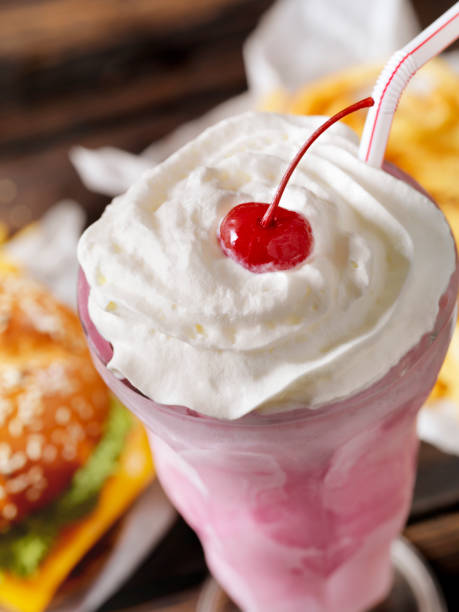 istock Strawberry Milkshake with a Burger and Fries 1149137967