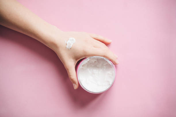 istock Female hand with cream. 1149138240