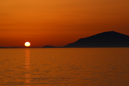 Amazing summer sunset taken on the beach on the greek island Kos.