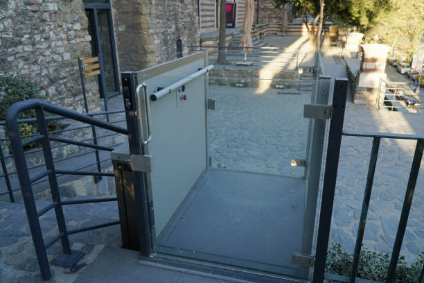 Wheelchair lift for disabled people at The Istanbul Tophane-i Amire art showroom Istanbul, Turkey - September 17, 2017 : A wheelchair lift for disabled people at The Istanbul, Tophane-i Amire art showroom. wheelchair lift stock pictures, royalty-free photos & images