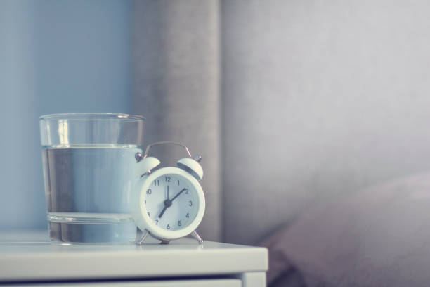 White retro alarm clock in the bedroom