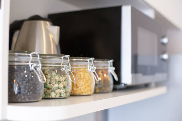 istock Bottles of bean put on table in kitchen. 1149142985