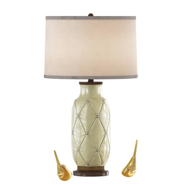 istock Table lamp and decorative golden birds on a white background 3d rendering 1149149085