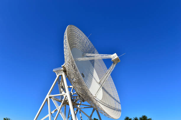 istock Array of satellite dishes or radio antennas against sky. Space o 1149151862