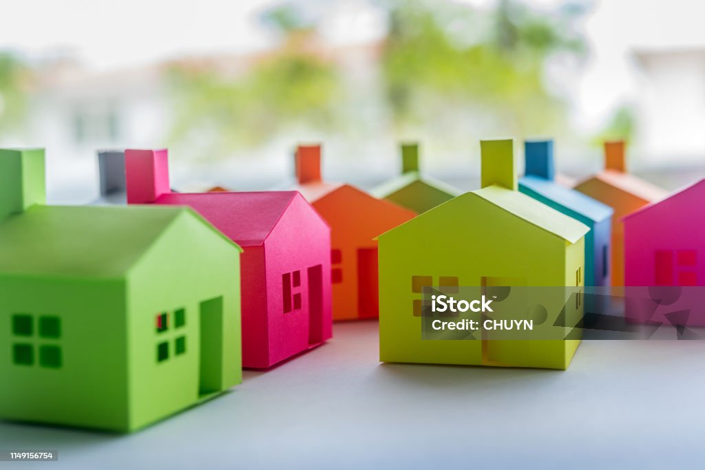Real estate market Pick your home. Group of multicolored houses on sale. House Stock Photo