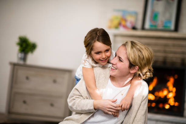 istock Mother Snuggling Her Young Daughter 1149156823