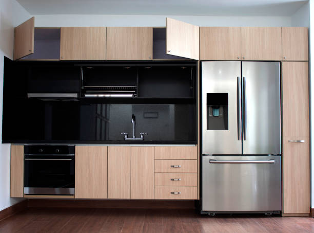 istock Interior design of clean modern wood and black kitchen. 1149160345