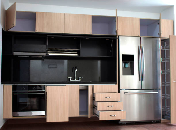 istock Interior design of clean modern wood and black kitchen 1149161022