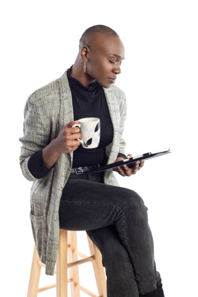 istock Keynote Speaker Preparing with Coffee and Tablet 1149165937