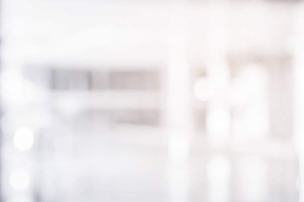 istock abstract blur soft focus white color interior of modern cleaning workplace background with shine light for design 1149166041