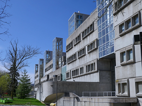 Hamilton, Canada - May 5, 2019: The teaching hospital of McMaster University is in a  modern architectural style with concrete and glass.