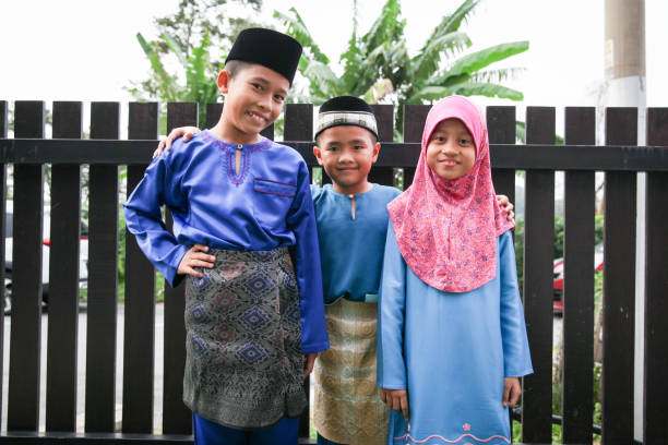 istock Malay Muslim Siblings in Malay Tradional Costume 1149176041