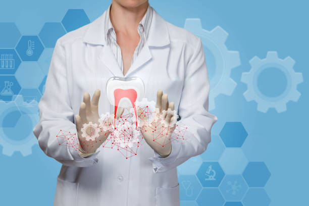 istock Doctor treats tooth . 1149178187