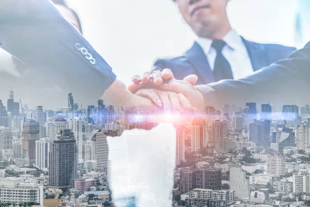 istock Teamwork Join Hands Support Together Concept.Business people shaking hands, finishing up a meeting. 1149178269