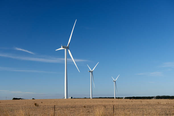 istock Three wind turbines on a farm in an Australian landscape. 1149179793