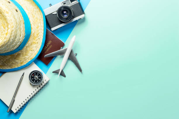 istock Summer Travel accessories on blue teal background copy space 1149189144