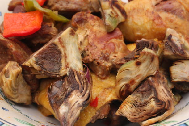 istock Preparing a stew with chicken and pork 1149191389