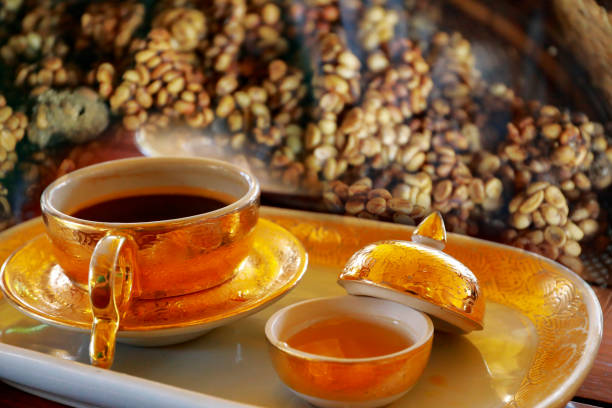 Kopi luwak or civet coffee, is coffee that includes partially digested coffee cherries, eaten and defecated by the Asian palm civet stock photo