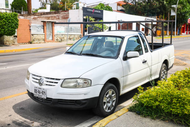 Volkswagen Saveiro Oaxaca, Mexico - May 25, 2017: Pickup car Volkswagen Saveiro in the city street. car transporter truck small car stock pictures, royalty-free photos & images