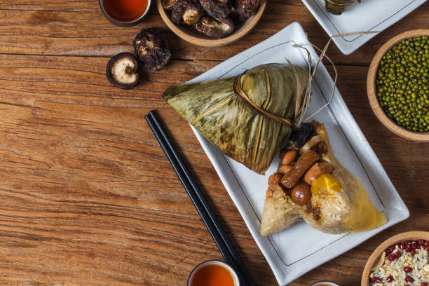 dragon boat festival dumplings de arroz - bamboo brown cooking gourmet fotografías e imágenes de stock