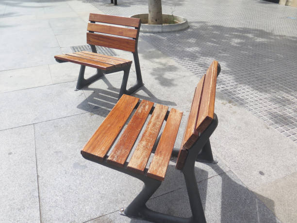 istock Two elegant single seats with wooden slats 1149205531