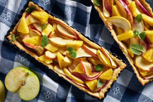 istock pineapple and apple sweet tart in Rectangular Tart Pans 1149207487