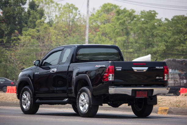 Private Pickup Truck Car Toyota Hilux Revo Chiangmai, Thailand - April 30 2019: Private Pickup Truck Car Toyota Hilux Revo. On road no.1001, 8 km from Chiangmai city. toyota hilux stock pictures, royalty-free photos & images