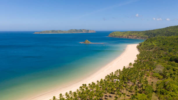 istock Beautiful island with a lagoon and a white beach. Nacpan Beach 1149211747