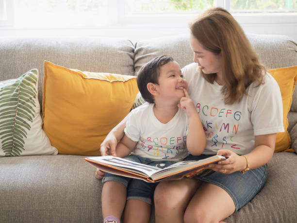 istock My mother was reading a book for my son 1149216163
