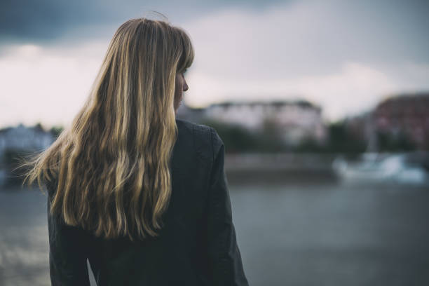 istock Lonely and pensive woman 1149216785