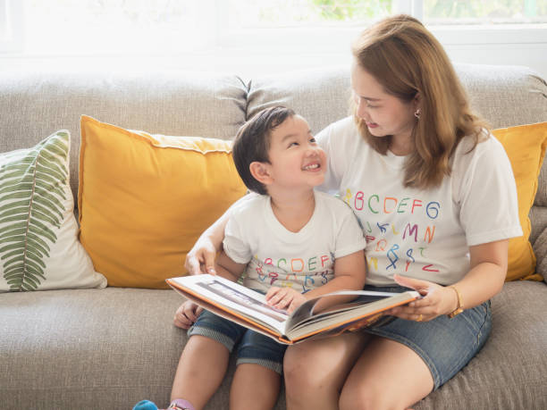 istock My mother was reading a book for my son 1149216970