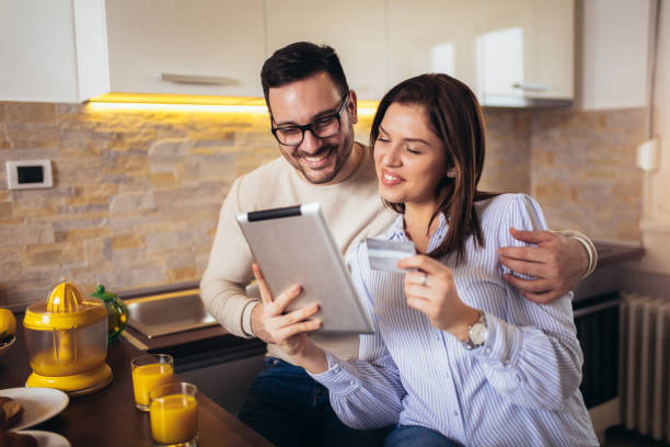 istock Young couple shopping on internet with tablet 1149217366