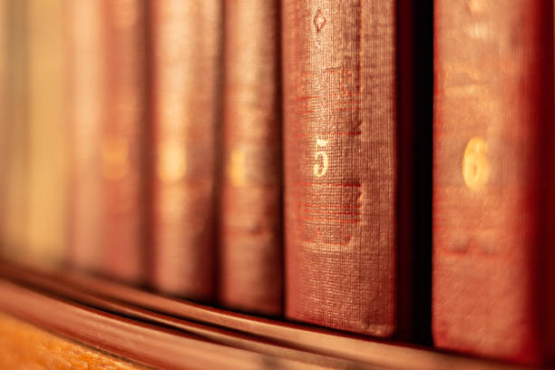 istock Old books with beautiful covers on the bookshelf. 1149220358
