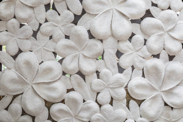 istock White cement  hibiscus flower stone 1149222806