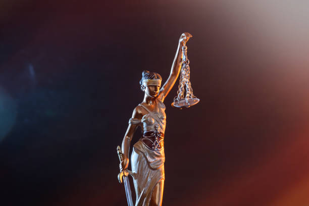 istock Statue goddess of justice on dark background 1149223861