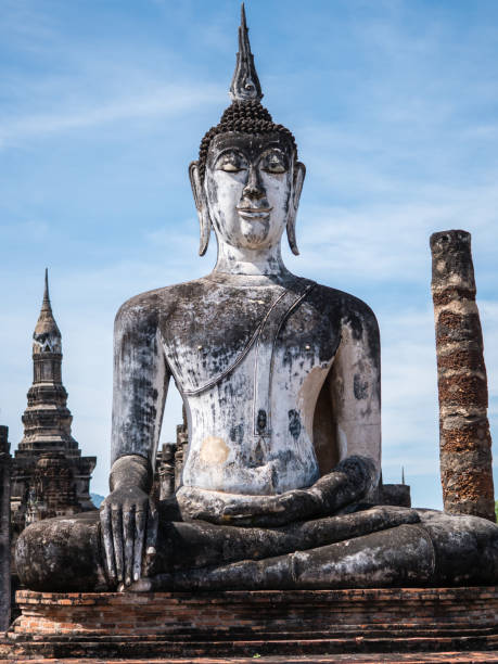 Buddha statue in ancient temple in Thailand stock photo