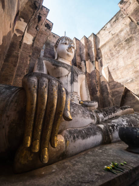 Big Buddha statue in ancient temple in Thailand stock photo