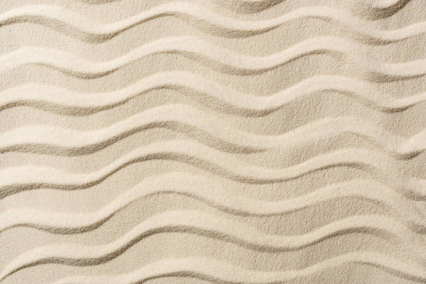 istock top view of textured background with sand and smooth waves 1149225516