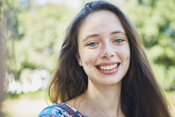 istock Beautiful smiling young brunette woman with cute dimples 1149227180
