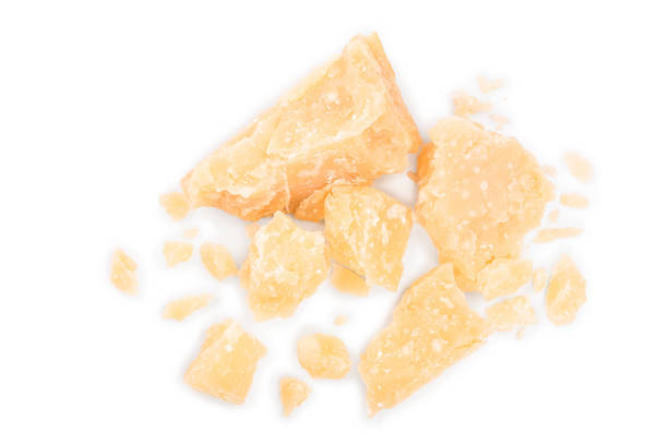 istock Parmesan cheese pieces isolated on white background. Closeup. Top view. Flat lay 1149227261