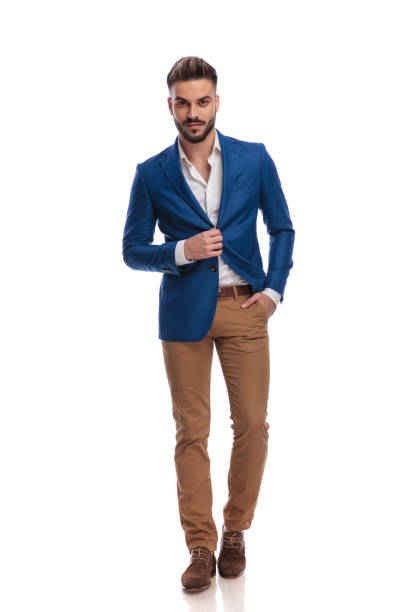 istock model man buttoning his lounge jacket with hand in pocket 1149228345
