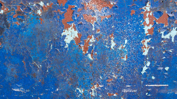 istock Blue painted metal background, with many cracks, peeling and flaking paint. Rusted texture 1149228408