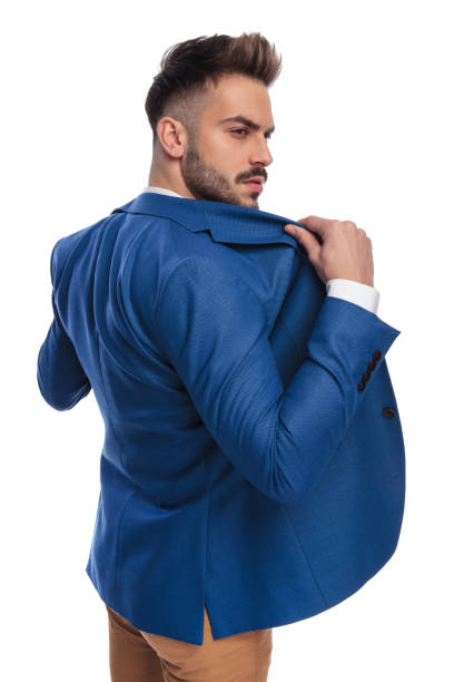 istock attractive man taking off or putting on his lounge jacket 1149228547