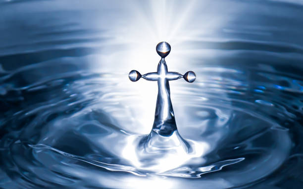 christian holy water with crucifix cross background. purity water for ritual. - batismo imagens e fotografias de stock