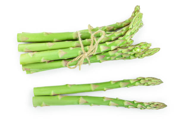 istock Fresh sprouts of asparagus isolated on white background. Top view. Flat lay 1149229200