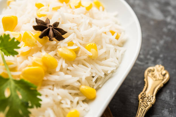 istock Corn Rice made using boiled Maize seeds with basmati rice, served in a bowl. selective focus 1149232306