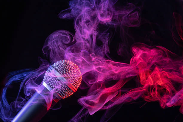 istock microphone in multicolored cloud of smoke 1149234716